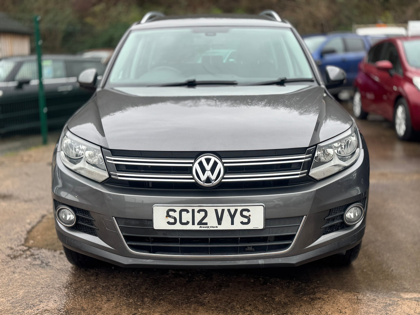 Volkswagen Tiguan 2.0 TDI BlueMotion Tech Sport DSG 4WD 2012